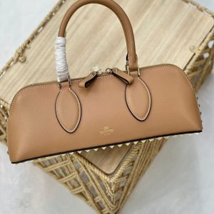 VALENTINO GARAVANI rockstud e/w leather duffle bag | Chicly Hub