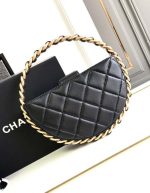 Chanel Black Quilted Leather Mini Round Camellia Clutch | Chicly Hub