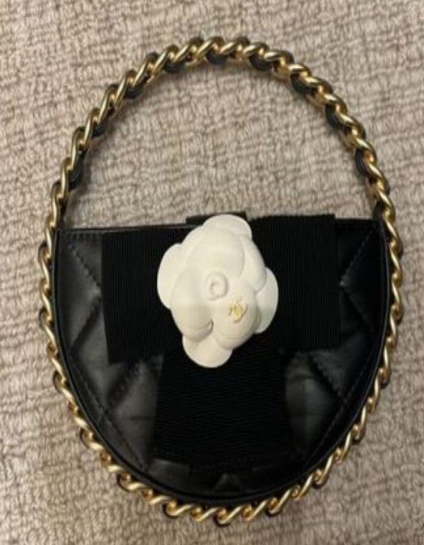 Chanel Black Quilted Leather Mini Round Camellia Clutch | Chicly Hub