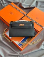 A CRAIE SWIFT LEATHER KELLY POCHETTE WITH GOLD HARDWARE | Chicly Hub