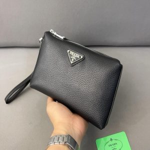 Prada logo-plaque clutch bag | Chicly Hub