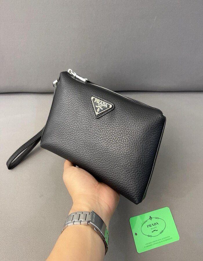 Prada logo-plaque clutch bag | Chicly Hub