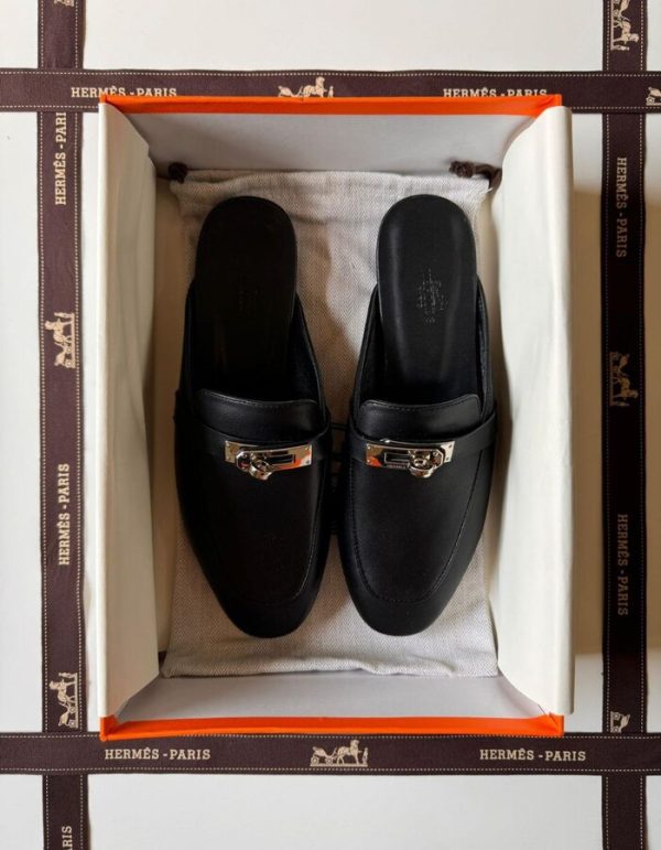 Hermes OZ Mule in Timeless Black is a classic footwear | Chicly Hub