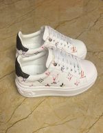 LOUIS VUITTON Lambskin Embossed Floral Monogram Time Out Sneakers | Chicly Hub