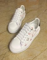 LOUIS VUITTON Lambskin Embossed Floral Monogram Time Out Sneakers | Chicly Hub