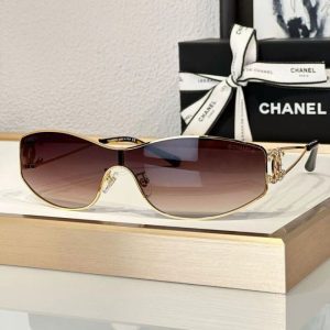 Chanel Logo Rhinestone Shield Sunglasses in Gold | Chicly Hub